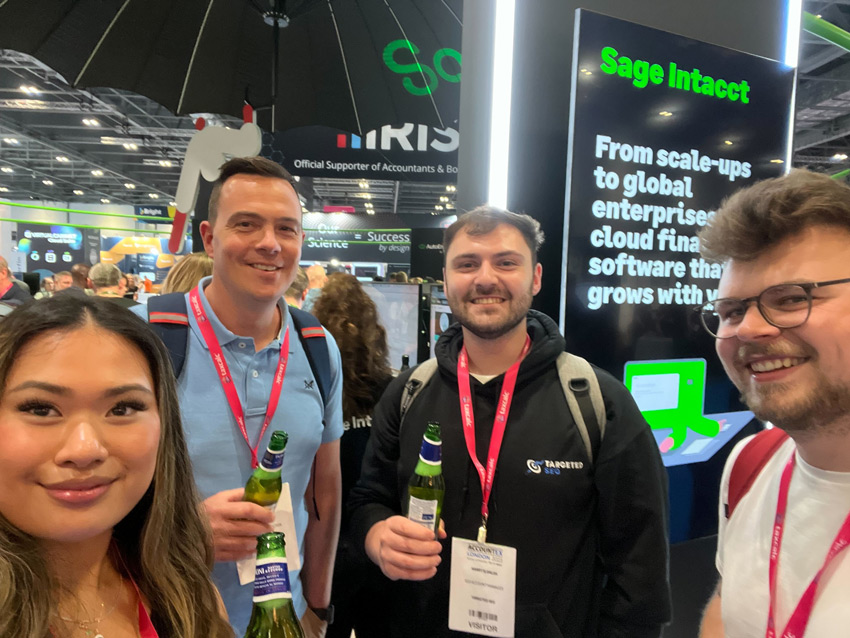 Targeted SEO team celebrating at the Sage stand Accountex
